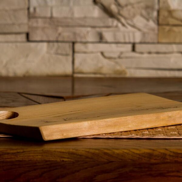 Kitchen cutting board of solid wood
