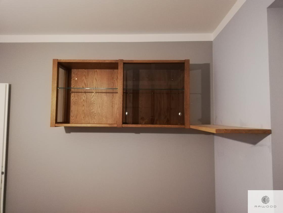 Shelves of solid oak wood and glass to office