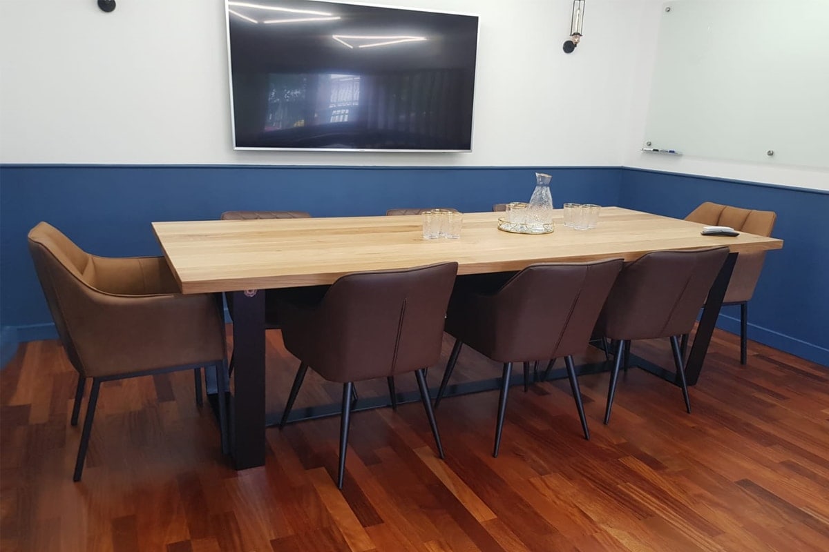 Conference table with oak table top and metal legs